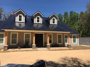 Roof Installation with a Black 26 Gauge Rib Metal Which has an Energy-Efficient Rating in Crystal River, FL (4)